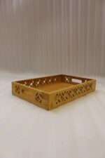 Set of 3 ONEMORE natural wood serving trays with carved geometric side patterns and built-in handles on a marble countertop