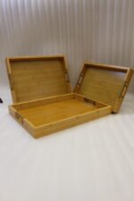 ONEMORE 3 piece natural wooden serving tray set with metallic brass handles resting on a kitchen countertop