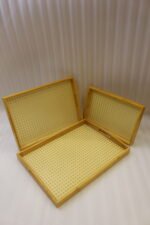 3 piece natural wooden serving tray set with woven cane rattan mesh bottom and side handles on a kitchen countertop