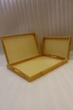 3 piece natural wooden serving tray set with woven cane rattan mesh bottom and side handles on a kitchen countertop