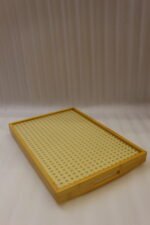 3 piece natural wooden serving tray set with woven cane rattan mesh bottom and side handles on a kitchen countertop
