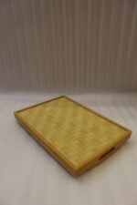 3 piece wooden serving tray set with floral printed base and built in handles on a kitchen countertop