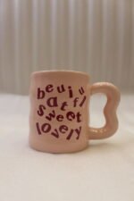 Three pastel ceramic coffee mugs in pink, light yellow, and blue featuring typography lettering and wavy handles on a marble kitchen Three pastel ceramic coffee mugs in pink, light yellow, and blue featuring typography lettering and wavy handles on a marble kitchen counter.Three pastel ceramic coffee mugs in pink, light yellow, and blue featuring typography lettering and wavy handles on a marble kitchen counter.Three pastel ceramic coffee mugs in pink, light yellow, and blue featuring typography lettering and wavy handles on a marble kitchen counter.Three pastel ceramic coffee mugs in pink, light yellow, and blue featuring typography lettering and wavy handles on a marble kitchen counter.Three pastel ceramic coffee mugs in pink, light yellow, and blue featuring typography lettering and wavy handles on a marble kitchen counter.Three pastel ceramic coffee mugs in pink, light yellow, and blue featuring typography lettering and wavy handles on a marble kitchen counter.Three pastel ceramic coffee mugs in pink, light yellow, and blue featuring typography lettering and wavy handles on a marble kitchen counter.counter.