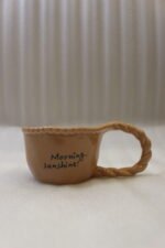 Three aesthetic ceramic coffee mugs with twisted braided handles and motivational quotes in peach, olive green, and cream on a kitchen counter.Three aesthetic ceramic coffee mugs with twisted braided handles and motivational quotes in peach, olive green, and cream on a kitchen counter.Three aesthetic ceramic coffee mugs with twisted braided handles and motivational quotes in peach, olive green, and cream on a kitchen counter.Three aesthetic ceramic coffee mugs with twisted braided handles and motivational quotes in peach, olive green, and cream on a kitchen counter.Three aesthetic ceramic coffee mugs with twisted braided handles and motivational quotes in peach, olive green, and cream on a kitchen counter.Three aesthetic ceramic coffee mugs with twisted braided handles and motivational quotes in peach, olive green, and cream on a kitchen counter.Three aesthetic ceramic coffee mugs with twisted braided handles and motivational quotes in peach, olive green, and cream on a kitchen counter.Three aesthetic ceramic coffee mugs with twisted braided handles and motivational quotes in peach, olive green, and cream on a kitchen counter.Three aesthetic ceramic coffee mugs with twisted braided handles and motivational quotes in peach, olive green, and cream on a kitchen counter.