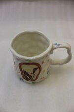 Handcrafted cream ceramic coffee mug featuring hand-painted botanical flower artwork, a scalloped rim, and an ergonomic wavy handle sitting on a marble countertop.Handcrafted cream ceramic coffee mug featuring hand-painted botanical flower artwork, a scalloped rim, and an ergonomic wavy handle sitting on a marble countertop.Handcrafted cream ceramic coffee mug featuring hand-painted botanical flower artwork, a scalloped rim, and an ergonomic wavy handle sitting on a marble countertop.Handcrafted cream ceramic coffee mug featuring hand-painted botanical flower artwork, a scalloped rim, and an ergonomic wavy handle sitting on a marble countertop.Handcrafted cream ceramic coffee mug featuring hand-painted botanical flower artwork, a scalloped rim, and an ergonomic wavy handle sitting on a marble countertop.Handcrafted cream ceramic coffee mug featuring hand-painted botanical flower artwork, a scalloped rim, and an ergonomic wavy handle sitting on a marble countertop.Handcrafted cream ceramic coffee mug featuring hand-painted botanical flower artwork, a scalloped rim, and an ergonomic wavy handle sitting on a marble countertop.Handcrafted cream ceramic coffee mug featuring hand-painted botanical flower artwork, a scalloped rim, and an ergonomic wavy handle sitting on a marble countertop.Handcrafted cream ceramic coffee mug featuring hand-painted botanical flower artwork, a scalloped rim, and an ergonomic wavy handle sitting on a marble countertop.Handcrafted cream ceramic coffee mug featuring hand-painted botanical flower artwork, a scalloped rim, and an ergonomic wavy handle sitting on a marble countertop.Handcrafted cream ceramic coffee mug featuring hand-painted botanical flower artwork, a scalloped rim, and an ergonomic wavy handle sitting on a marble countertop.Handcrafted cream ceramic coffee mug featuring hand-painted botanical flower artwork, a scalloped rim, and an ergonomic wavy handle sitting on a marble countertop.Handcrafted cream ceramic coffee mug featuring hand-painted botanical flower artwork, a scalloped rim, and an ergonomic wavy handle sitting on a marble countertop.Handcrafted cream ceramic coffee mug featuring hand-painted botanical flower artwork, a scalloped rim, and an ergonomic wavy handle sitting on a marble countertop.Handcrafted cream ceramic coffee mug featuring hand-painted botanical flower artwork, a scalloped rim, and an ergonomic wavy handle sitting on a marble countertop.Handcrafted cream ceramic coffee mug featuring hand-painted botanical flower artwork, a scalloped rim, and an ergonomic wavy handle sitting on a marble countertop.Handcrafted cream ceramic coffee mug featuring hand-painted botanical flower artwork, a scalloped rim, and an ergonomic wavy handle sitting on a marble countertop.Handcrafted cream ceramic coffee mug featuring hand-painted botanical flower artwork, a scalloped rim, and an ergonomic wavy handle sitting on a marble countertop.Handcrafted cream ceramic coffee mug featuring hand-painted botanical flower artwork, a scalloped rim, and an ergonomic wavy handle sitting on a marble countertop.Handcrafted cream ceramic coffee mug featuring hand-painted botanical flower artwork, a scalloped rim, and an ergonomic wavy handle sitting on a marble countertop.Handcrafted cream ceramic coffee mug featuring hand-painted botanical flower artwork, a scalloped rim, and an ergonomic wavy handle sitting on a marble countertop.Handcrafted cream ceramic coffee mug featuring hand-painted botanical flower artwork, a scalloped rim, and an ergonomic wavy handle sitting on a marble countertop.Handcrafted cream ceramic coffee mug featuring hand-painted botanical flower artwork, a scalloped rim, and an ergonomic wavy handle sitting on a marble countertop.Handcrafted cream ceramic coffee mug featuring hand-painted botanical flower artwork, a scalloped rim, and an ergonomic wavy handle sitting on a marble countertop.Handcrafted cream ceramic coffee mug featuring hand-painted botanical flower artwork, a scalloped rim, and an ergonomic wavy handle sitting on a marble countertop.Handcrafted cream ceramic coffee mug featuring hand-painted botanical flower artwork, a scalloped rim, and an ergonomic wavy handle sitting on a marble countertop.Handcrafted cream ceramic coffee mug featuring hand-painted botanical flower artwork, a scalloped rim, and an ergonomic wavy handle sitting on a marble countertop.Handcrafted cream ceramic coffee mug featuring hand-painted botanical flower artwork, a scalloped rim, and an ergonomic wavy handle sitting on a marble countertop.Handcrafted cream ceramic coffee mug featuring hand-painted botanical flower artwork, a scalloped rim, and an ergonomic wavy handle sitting on a marble countertop.Handcrafted cream ceramic coffee mug featuring hand-painted botanical flower artwork, a scalloped rim, and an ergonomic wavy handle sitting on a marble countertop.Handcrafted cream ceramic coffee mug featuring hand-painted botanical flower artwork, a scalloped rim, and an ergonomic wavy handle sitting on a marble countertop.Handcrafted cream ceramic coffee mug featuring hand-painted botanical flower artwork, a scalloped rim, and an ergonomic wavy handle sitting on a marble countertop.Handcrafted cream ceramic coffee mug featuring hand-painted botanical flower artwork, a scalloped rim, and an ergonomic wavy handle sitting on a marble countertop.Handcrafted cream ceramic coffee mug featuring hand-painted botanical flower artwork, a scalloped rim, and an ergonomic wavy handle sitting on a marble countertop.Handcrafted cream ceramic coffee mug featuring hand-painted botanical flower artwork, a scalloped rim, and an ergonomic wavy handle sitting on a marble countertop.Handcrafted cream ceramic coffee mug featuring hand-painted botanical flower artwork, a scalloped rim, and an ergonomic wavy handle sitting on a marble countertop.Handcrafted cream ceramic coffee mug featuring hand-painted botanical flower artwork, a scalloped rim, and an ergonomic wavy handle sitting on a marble countertop.Handcrafted cream ceramic coffee mug featuring hand-painted botanical flower artwork, a scalloped rim, and an ergonomic wavy handle sitting on a marble countertop.Handcrafted cream ceramic coffee mug featuring hand-painted botanical flower artwork, a scalloped rim, and an ergonomic wavy handle sitting on a marble countertop.Handcrafted cream ceramic coffee mug featuring hand-painted botanical flower artwork, a scalloped rim, and an ergonomic wavy handle sitting on a marble countertop.Handcrafted cream ceramic coffee mug featuring hand-painted botanical flower artwork, a scalloped rim, and an ergonomic wavy handle sitting on a marble countertop.Handcrafted cream ceramic coffee mug featuring hand-painted botanical flower artwork, a scalloped rim, and an ergonomic wavy handle sitting on a marble countertop.Handcrafted cream ceramic coffee mug featuring hand-painted botanical flower artwork, a scalloped rim, and an ergonomic wavy handle sitting on a marble countertop.Handcrafted cream ceramic coffee mug featuring hand-painted botanical flower artwork, a scalloped rim, and an ergonomic wavy handle sitting on a marble countertop.Handcrafted cream ceramic coffee mug featuring hand-painted botanical flower artwork, a scalloped rim, and an ergonomic wavy handle sitting on a marble countertop.Handcrafted cream ceramic coffee mug featuring hand-painted botanical flower artwork, a scalloped rim, and an ergonomic wavy handle sitting on a marble countertop.Handcrafted cream ceramic coffee mug featuring hand-painted botanical flower artwork, a scalloped rim, and an ergonomic wavy handle sitting on a marble countertop.Handcrafted cream ceramic coffee mug featuring hand-painted botanical flower artwork, a scalloped rim, and an ergonomic wavy handle sitting on a marble countertop.Handcrafted cream ceramic coffee mug featuring hand-painted botanical flower artwork, a scalloped rim, and an ergonomic wavy handle sitting on a marble countertop.Handcrafted cream ceramic coffee mug featuring hand-painted botanical flower artwork, a scalloped rim, and an ergonomic wavy handle sitting on a marble countertop.Handcrafted cream ceramic coffee mug featuring hand-painted botanical flower artwork, a scalloped rim, and an ergonomic wavy handle sitting on a marble countertop.Handcrafted cream ceramic coffee mug featuring hand-painted botanical flower artwork, a scalloped rim, and an ergonomic wavy handle sitting on a marble countertop.Handcrafted cream ceramic coffee mug featuring hand-painted botanical flower artwork, a scalloped rim, and an ergonomic wavy handle sitting on a marble countertop.Handcrafted cream ceramic coffee mug featuring hand-painted botanical flower artwork, a scalloped rim, and an ergonomic wavy handle sitting on a marble countertop.Handcrafted cream ceramic coffee mug featuring hand-painted botanical flower artwork, a scalloped rim, and an ergonomic wavy handle sitting on a marble countertop.Handcrafted cream ceramic coffee mug featuring hand-painted botanical flower artwork, a scalloped rim, and an ergonomic wavy handle sitting on a marble countertop.Handcrafted cream ceramic coffee mug featuring hand-painted botanical flower artwork, a scalloped rim, and an ergonomic wavy handle sitting on a marble countertop.