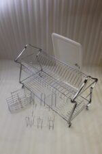 2-tier stainless steel dish drying rack on a marble kitchen countertop with drip tray and utensil holder