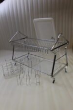 2-tier stainless steel dish drying rack on a marble kitchen countertop with drip tray and utensil holder