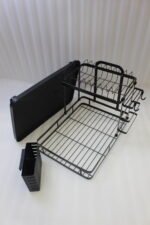 Modern 2-tier black metal dish drying rack with side utensil caddy and bottom drain tray on a kitchen countertop.