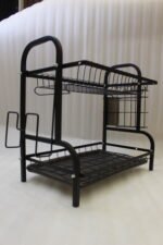 2-tier black metal dish drying rack with utensil holder and drip tray on a marble kitchen countertop