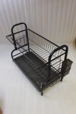 2-tier black metal dish drying rack with removable drain tray and side utensil holder on a kitchen countertop