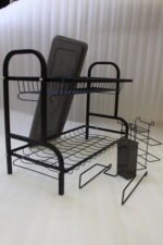 2-tier black metal dish drying rack with removable drain tray and side utensil holder on a kitchen countertop