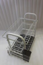 White 2-tier metal wire dish drying rack with removable dark gray drain tray and side utensil holder on a marble kitchen countertop.