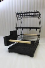 3-tier black wire dish drying rack on a marble countertop with wooden handles, attached utensil holder, and removable drip tray