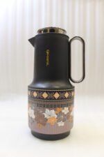Feenik 1 liter thermal vacuum coffee and tea flasks in taupe, black, and cream with ornamental floral patFeenik 1 liter thermal vacuum coffee and tea flasks in taupe, black, and cream with ornamental floral patterns on a kitchen counter.Feenik 1 liter thermal vacuum coffee and tea flasks in taupe, black, and cream with ornamental floral patterns on a kitchen counter.terns on a kitchen counter.