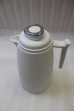 Three One More 1 Liter modern thermal vacuum flasks in charcoal grey, taupe beige, and white standing onThree One More 1 Liter modern thermal vacuum flasks in charcoal grey, taupe beige, and white standing on a white kitchen marble countertop.Three One More 1 Liter modern thermal vacuum flasks in charcoal grey, taupe beige, and white standing on a white kitchen marble countertop.Three One More 1 Liter modern thermal vacuum flasks in charcoal grey, taupe beige, and white standing on a white kitchen marble countertop.Three One More 1 Liter modern thermal vacuum flasks in charcoal grey, taupe beige, and white standing on a white kitchen marble countertop.Three One More 1 Liter modern thermal vacuum flasks in charcoal grey, taupe beige, and white standing on a white kitchen marble countertop.Three One More 1 Liter modern thermal vacuum flasks in charcoal grey, taupe beige, and white standing on a white kitchen marble countertop.Three One More 1 Liter modern thermal vacuum flasks in charcoal grey, taupe beige, and white standing on a white kitchen marble countertop.Three One More 1 Liter modern thermal vacuum flasks in charcoal grey, taupe beige, and white standing on a white kitchen marble countertop. a white kitchen marble countertop.