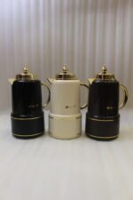 Three luxury 1-liter MIXFF vacuum flasks in black, cream, and dark brown with gold handles and spouts on a maThree luxury 1-liter MIXFF vacuum flasks in black, cream, and dark brown with gold handles and spouts on a marble countertop.Three luxury 1-liter MIXFF vacuum flasks in black, cream, and dark brown with gold handles and spouts on a marble countertop.Three luxury 1-liter MIXFF vacuum flasks in black, cream, and dark brown with gold handles and spouts on a marble countertop.Three luxury 1-liter MIXFF vacuum flasks in black, cream, and dark brown with gold handles and spouts on a marble countertop.Three luxury 1-liter MIXFF vacuum flasks in black, cream, and dark brown with gold handles and spouts on a marble countertop.Three luxury 1-liter MIXFF vacuum flasks in black, cream, and dark brown with gold handles and spouts on a marble countertop.Three luxury 1-liter MIXFF vacuum flasks in black, cream, and dark brown with gold handles and spouts on a marble countertop.Three luxury 1-liter MIXFF vacuum flasks in black, cream, and dark brown with gold handles and spouts on a marble countertop.Three luxury 1-liter MIXFF vacuum flasks in black, cream, and dark brown with gold handles and spouts on a marble countertop.Three luxury 1-liter MIXFF vacuum flasks in black, cream, and dark brown with gold handles and spouts on a marble countertop.Three luxury 1-liter MIXFF vacuum flasks in black, cream, and dark brown with gold handles and spouts on a marble countertop.Three luxury 1-liter MIXFF vacuum flasks in black, cream, and dark brown with gold handles and spouts on a marble countertop.Three luxury 1-liter MIXFF vacuum flasks in black, cream, and dark brown with gold handles and spouts on a marble countertop.Three luxury 1-liter MIXFF vacuum flasks in black, cream, and dark brown with gold handles and spouts on a marble countertop.Three luxury 1-liter MIXFF vacuum flasks in black, cream, and dark brown with gold handles and spouts on a marble countertop.Three luxury 1-liter MIXFF vacuum flasks in black, cream, and dark brown with gold handles and spouts on a marble countertop.Three luxury 1-liter MIXFF vacuum flasks in black, cream, and dark brown with gold handles and spouts on a marble countertop.Three luxury 1-liter MIXFF vacuum flasks in black, cream, and dark brown with gold handles and spouts on a marble countertop.Three luxury 1-liter MIXFF vacuum flasks in black, cream, and dark brown with gold handles and spouts on a marble countertop.rble countertop.
