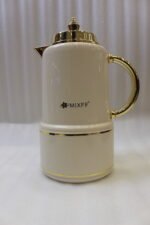 Three luxury 1-liter MIXFF vacuum flasks in black, cream, and dark brown with gold handles and spouts on a marble countertop.Three luxury 1-liter MIXFF vacuum flasks in black, cream, and dark brown with gold handles and spouts on a marble countertop.Three luxury 1-liter MIXFF vacuum flasks in black, cream, and dark brown with gold handles and spouts on a marble countertop.Three luxury 1-liter MIXFF vacuum flasks in black, cream, and dark brown with gold handles and spouts on a marble countertop.Three luxury 1-liter MIXFF vacuum flasks in black, cream, and dark brown with gold handles and spouts on a marble countertop.Three luxury 1-liter MIXFF vacuum flasks in black, cream, and dark brown with gold handles and spouts on a marble countertop.Three luxury 1-liter MIXFF vacuum flasks in black, cream, and dark brown with gold handles and spouts on a marble countertop.Three luxury 1-liter MIXFF vacuum flasks in black, cream, and dark brown with gold handles and spouts on a marble countertop.Three luxury 1-liter MIXFF vacuum flasks in black, cream, and dark brown with gold handles and spouts on a marble countertop.Three luxury 1-liter MIXFF vacuum flasks in black, cream, and dark brown with gold handles and spouts on a marble countertop.Three luxury 1-liter MIXFF vacuum flasks in black, cream, and dark brown with gold handles and spouts on a marble countertop.Three luxury 1-liter MIXFF vacuum flasks in black, cream, and dark brown with gold handles and spouts on a marble countertop.Three luxury 1-liter MIXFF vacuum flasks in black, cream, and dark brown with gold handles and spouts on a marble countertop.Three luxury 1-liter MIXFF vacuum flasks in black, cream, and dark brown with gold handles and spouts on a marble countertop.Three luxury 1-liter MIXFF vacuum flasks in black, cream, and dark brown with gold handles and spouts on a marble countertop.Three luxury 1-liter MIXFF vacuum flasks in black, cream, and dark brown with gold handles and spouts on a marble countertop.Three luxury 1-liter MIXFF vacuum flasks in black, cream, and dark brown with gold handles and spouts on a marble countertop.Three luxury 1-liter MIXFF vacuum flasks in black, cream, and dark brown with gold handles and spouts on a marble countertop.Three luxury 1-liter MIXFF vacuum flasks in black, cream, and dark brown with gold handles and spouts on a marble countertop.Three luxury 1-liter MIXFF vacuum flasks in black, cream, and dark brown with gold handles and spouts on a marble countertop.Three luxury 1-liter MIXFF vacuum flasks in black, cream, and dark brown with gold handles and spouts on a marble countertop.Three luxury 1-liter MIXFF vacuum flasks in black, cream, and dark brown with gold handles and spouts on a marble countertop.Three luxury 1-liter MIXFF vacuum flasks in black, cream, and dark brown with gold handles and spouts on a marble countertop.Three luxury 1-liter MIXFF vacuum flasks in black, cream, and dark brown with gold handles and spouts on a marble countertop.Three luxury 1-liter MIXFF vacuum flasks in black, cream, and dark brown with gold handles and spouts on a marble countertop.Three luxury 1-liter MIXFF vacuum flasks in black, cream, and dark brown with gold handles and spouts on a marble countertop.Three luxury 1-liter MIXFF vacuum flasks in black, cream, and dark brown with gold handles and spouts on a marble countertop.Three luxury 1-liter MIXFF vacuum flasks in black, cream, and dark brown with gold handles and spouts on a marble countertop.Three luxury 1-liter MIXFF vacuum flasks in black, cream, and dark brown with gold handles and spouts on a marble countertop.Three luxury 1-liter MIXFF vacuum flasks in black, cream, and dark brown with gold handles and spouts on a marble countertop.Three luxury 1-liter MIXFF vacuum flasks in black, cream, and dark brown with gold handles and spouts on a marble countertop.Three luxury 1-liter MIXFF vacuum flasks in black, cream, and dark brown with gold handles and spouts on a marble countertop.Three luxury 1-liter MIXFF vacuum flasks in black, cream, and dark brown with gold handles and spouts on a marble countertop.Three luxury 1-liter MIXFF vacuum flasks in black, cream, and dark brown with gold handles and spouts on a marble countertop.Three luxury 1-liter MIXFF vacuum flasks in black, cream, and dark brown with gold handles and spouts on a marble countertop.Three luxury 1-liter MIXFF vacuum flasks in black, cream, and dark brown with gold handles and spouts on a marble countertop.Three luxury 1-liter MIXFF vacuum flasks in black, cream, and dark brown with gold handles and spouts on a marble countertop.Three luxury 1-liter MIXFF vacuum flasks in black, cream, and dark brown with gold handles and spouts on a marble countertop.Three luxury 1-liter MIXFF vacuum flasks in black, cream, and dark brown with gold handles and spouts on a marble countertop.Three luxury 1-liter MIXFF vacuum flasks in black, cream, and dark brown with gold handles and spouts on a marble countertop.Three luxury 1-liter MIXFF vacuum flasks in black, cream, and dark brown with gold handles and spouts on a marble countertop.