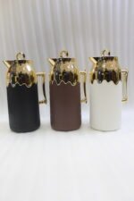 Three One More 1 Liter luxury thermal vacuum flasks in black, brown, and cream with fluted ribbed bodies, ornate gold handles, and gold crown tops on a marble kitchen counter.Three One More 1 Liter luxury thermal vacuum flasks in black, brown, and cream with fluted ribbed bodies, ornate gold handles, and gold crown tops on a marble kitchen counter.Three One More 1 Liter luxury thermal vacuum flasks in black, brown, and cream with fluted ribbed bodies, ornate gold handles, and gold crown tops on a marble kitchen counter.Three One More 1 Liter luxury thermal vacuum flasks in black, brown, and cream with fluted ribbed bodies, ornate gold handles, and gold crown tops on a marble kitchen counter.Three One More 1 Liter luxury thermal vacuum flasks in black, brown, and cream with fluted ribbed bodies, ornate gold handles, and gold crown tops on a marble kitchen counter.Three One More 1 Liter luxury thermal vacuum flasks in black, brown, and cream with fluted ribbed bodies, ornate gold handles, and gold crown tops on a marble kitchen counter.Three One More 1 Liter luxury thermal vacuum flasks in black, brown, and cream with fluted ribbed bodies, ornate gold handles, and gold crown tops on a marble kitchen counter.Three One More 1 Liter luxury thermal vacuum flasks in black, brown, and cream with fluted ribbed bodies, ornate gold handles, and gold crown tops on a marble kitchen counter.Three One More 1 Liter luxury thermal vacuum flasks in black, brown, and cream with fluted ribbed bodies, ornate gold handles, and gold crown tops on a marble kitchen counter.Three One More 1 Liter luxury thermal vacuum flasks in black, brown, and cream with fluted ribbed bodies, ornate gold handles, and gold crown tops on a marble kitchen counter.Three One More 1 Liter luxury thermal vacuum flasks in black, brown, and cream with fluted ribbed bodies, ornate gold handles, and gold crown tops on a marble kitchen counter.Three One More 1 Liter luxury thermal vacuum flasks in black, brown, and cream with fluted ribbed bodies, ornate gold handles, and gold crown tops on a marble kitchen counter.Three One More 1 Liter luxury thermal vacuum flasks in black, brown, and cream with fluted ribbed bodies, ornate gold handles, and gold crown tops on a marble kitchen counter.Three One More 1 Liter luxury thermal vacuum flasks in black, brown, and cream with fluted ribbed bodies, ornate gold handles, and gold crown tops on a marble kitchen counter.Three One More 1 Liter luxury thermal vacuum flasks in black, brown, and cream with fluted ribbed bodies, ornate gold handles, and gold crown tops on a marble kitchen counter.Three One More 1 Liter luxury thermal vacuum flasks in black, brown, and cream with fluted ribbed bodies, ornate gold handles, and gold crown tops on a marble kitchen counter.Three One More 1 Liter luxury thermal vacuum flasks in black, brown, and cream with fluted ribbed bodies, ornate gold handles, and gold crown tops on a marble kitchen counter.Three One More 1 Liter luxury thermal vacuum flasks in black, brown, and cream with fluted ribbed bodies, ornate gold handles, and gold crown tops on a marble kitchen counter.Three One More 1 Liter luxury thermal vacuum flasks in black, brown, and cream with fluted ribbed bodies, ornate gold handles, and gold crown tops on a marble kitchen counter.Three One More 1 Liter luxury thermal vacuum flasks in black, brown, and cream with fluted ribbed bodies, ornate gold handles, and gold crown tops on a marble kitchen counter.Three One More 1 Liter luxury thermal vacuum flasks in black, brown, and cream with fluted ribbed bodies, ornate gold handles, and gold crown tops on a marble kitchen counter.Three One More 1 Liter luxury thermal vacuum flasks in black, brown, and cream with fluted ribbed bodies, ornate gold handles, and gold crown tops on a marble kitchen counter.