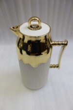 Three One More 1 Liter luxury thermal vacuum flasks in black, brown, and cream with fluted ribbed bodies, ornate gold handles, and gold crown tops on a marble kitchen counter.Three One More 1 Liter luxury thermal vacuum flasks in black, brown, and cream with fluted ribbed bodies, ornate gold handles, and gold crown tops on a marble kitchen counter.Three One More 1 Liter luxury thermal vacuum flasks in black, brown, and cream with fluted ribbed bodies, ornate gold handles, and gold crown tops on a maThree One More 1 Liter luxury thermal vacuum flasks in black, brown, and cream with fluted ribbed bodies, ornate gold handles, and gold crown tops on a marble kitchen counter.Three One More 1 Liter luxury thermal vacuum flasks in black, brown, and cream with fluted ribbed bodies, ornate gold handles, and gold crown tops on a marble kitchen counter.Three One More 1 Liter luxury thermal vacuum flasks in black, brown, and cream with fluted ribbed bodies, ornate gold handles, and gold crown tops on a marble kitchen counter.Three One More 1 Liter luxury thermal vacuum flasks in black, brown, and cream with fluted ribbed bodies, ornate gold handles, and gold crown tops on a marble kitchen counter.Three One More 1 Liter luxury thermal vacuum flasks in black, brown, and cream with fluted ribbed bodies, ornate gold handles, and gold crown tops on a marble kitchen counter.Three One More 1 Liter luxury thermal vacuum flasks in black, brown, and cream with fluted ribbed bodies, ornate gold handles, and gold crown tops on a marble kitchen counter.Three One More 1 Liter luxury thermal vacuum flasks in black, brown, and cream with fluted ribbed bodies, ornate gold handles, and gold crown tops on a marble kitchen counter.Three One More 1 Liter luxury thermal vacuum flasks in black, brown, and cream with fluted ribbed bodies, ornate gold handles, and gold crown tops on a marble kitchen counter.Three One More 1 Liter luxury thermal vacuum flasks in black, brown, and cream with fluted ribbed bodies, ornate gold handles, and gold crown tops on a marble kitchen counter.Three One More 1 Liter luxury thermal vacuum flasks in black, brown, and cream with fluted ribbed bodies, ornate gold handles, and gold crown tops on a marble kitchen counter.Three One More 1 Liter luxury thermal vacuum flasks in black, brown, and cream with fluted ribbed bodies, ornate gold handles, and gold crown tops on a marble kitchen counter.Three One More 1 Liter luxury thermal vacuum flasks in black, brown, and cream with fluted ribbed bodies, ornate gold handles, and gold crown tops on a marble kitchen counter.Three One More 1 Liter luxury thermal vacuum flasks in black, brown, and cream with fluted ribbed bodies, ornate gold handles, and gold crown tops on a marble kitchen counter.Three One More 1 Liter luxury thermal vacuum flasks in black, brown, and cream with fluted ribbed bodies, ornate gold handles, and gold crown tops on a marble kitchen counter.Three One More 1 Liter luxury thermal vacuum flasks in black, brown, and cream with fluted ribbed bodies, ornate gold handles, and gold crown tops on a marble kitchen counter.Three One More 1 Liter luxury thermal vacuum flasks in black, brown, and cream with fluted ribbed bodies, ornate gold handles, and gold crown tops on a marble kitchen counter.Three One More 1 Liter luxury thermal vacuum flasks in black, brown, and cream with fluted ribbed bodies, ornate gold handles, and gold crown tops on a marble kitchen counter.Three One More 1 Liter luxury thermal vacuum flasks in black, brown, and cream with fluted ribbed bodies, ornate gold handles, and gold crown tops on a marble kitchen counter.rble kitchen counter.