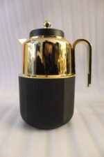Three One More 1-liter luxury thermal vacuum flasks with polished gold-tone tops and textured ribbed bases in matte black, off-white, and grey resting on a marble kitchen countertop.Three One More 1-liter luxury thermal vacuum flasks with polished gold-tone tops and textured ribbed bases in matte black, off-white, and grey resting on a marble kitchen countertop.Three One More 1-liter luxury thermal vacuum flasks with polished gold-tone tops and textured ribbed bases in matte black, off-white, and grey resting on a marble kitchen countertop.Three One More 1-liter luxury thermal vacuum flasks with polished gold-tone tops and textured ribbed bases in matte black, off-white, and grey resting on a marble kitchen countertop.Three One More 1-liter luxury thermal vacuum flasks with polished gold-tone tops and textured ribbed bases in matte black, off-white, and grey resting on a marble kitchen countertop.Three One More 1-liter luxury thermal vacuum flasks with polished gold-tone tops and textured ribbed bases in matte black, off-white, and grey resting on a marble kitchen countertop.Three One More 1-liter luxury thermal vacuum flasks with polished gold-tone tops and textured ribbed bases in matte black, off-white, and grey resting on a marble kitchen countertop.Three One More 1-liter luxury thermal vacuum flasks with polished gold-tone tops and textured ribbed bases in matte black, off-white, and grey resting on a marble kitchen countertop.Three One More 1-liter luxury thermal vacuum flasks with polished gold-tone tops and textured ribbed bases in matte black, off-white, and grey resting on a marble kitchen countertop.Three One More 1-liter luxury thermal vacuum flasks with polished gold-tone tops and textured ribbed bases in matte black, off-white, and grey resting on a marble kitchen countertop.Three One More 1-liter luxury thermal vacuum flasks with polished gold-tone tops and textured ribbed bases in matte black, off-white, and grey resting on a marble kitchen countertop.Three One More 1-liter luxury thermal vacuum flasks with polished gold-tone tops and textured ribbed bases in matte black, off-white, and grey resting on a marble kitchen countertop.