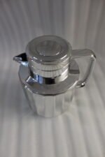 One More 1 Liter polished fluted stainless steel thermal vacuum flask on a marble kitchen countertop