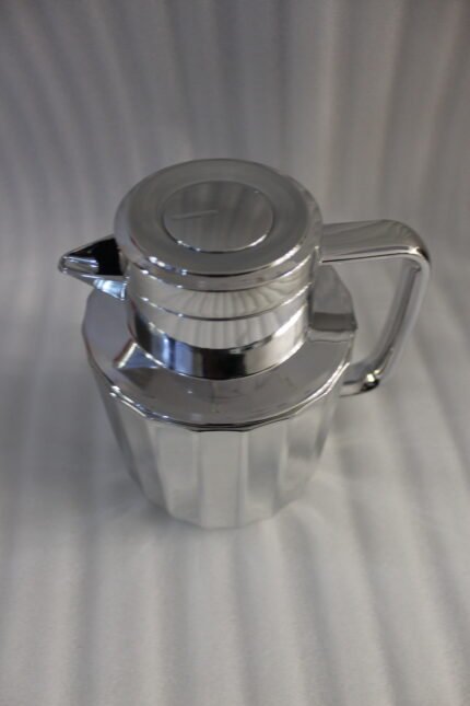 One More 1 Liter polished fluted stainless steel thermal vacuum flask on a marble kitchen countertop