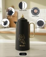 Black 1 litre Feenik thermal flask with gold floral design, glass inside, push-then-pour mechanism, and airtight cap displayed on a kitchen counter
